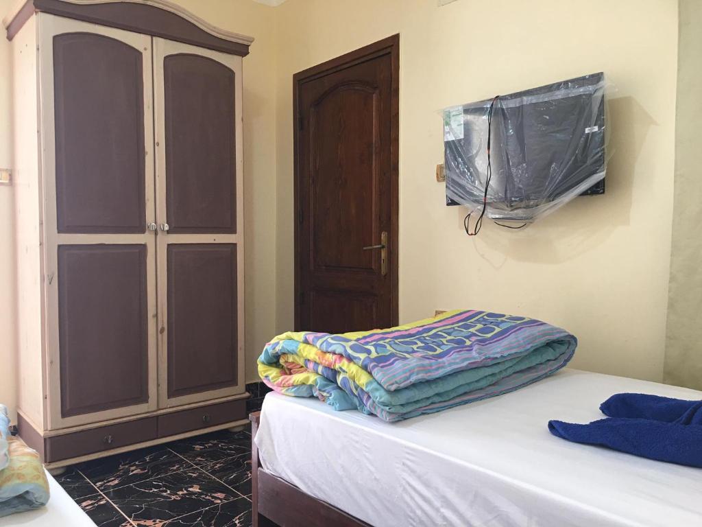 Postel nebo postele na pokoji v ubytování Dahab Home bed&breakfast