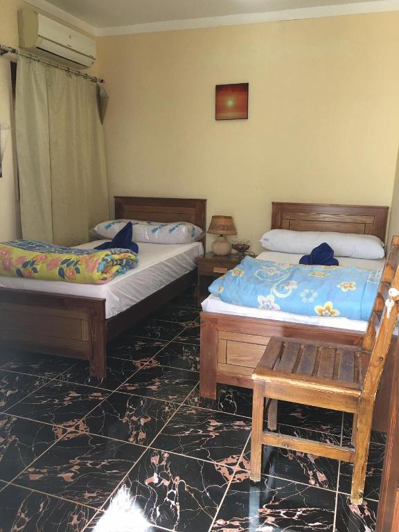 Postel nebo postele na pokoji v ubytování Dahab Home bed&breakfast