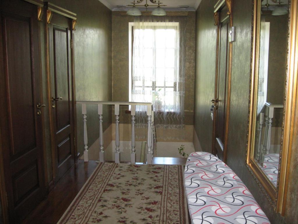 Postel nebo postele na pokoji v ubytování Guesthouse Grand Canyon