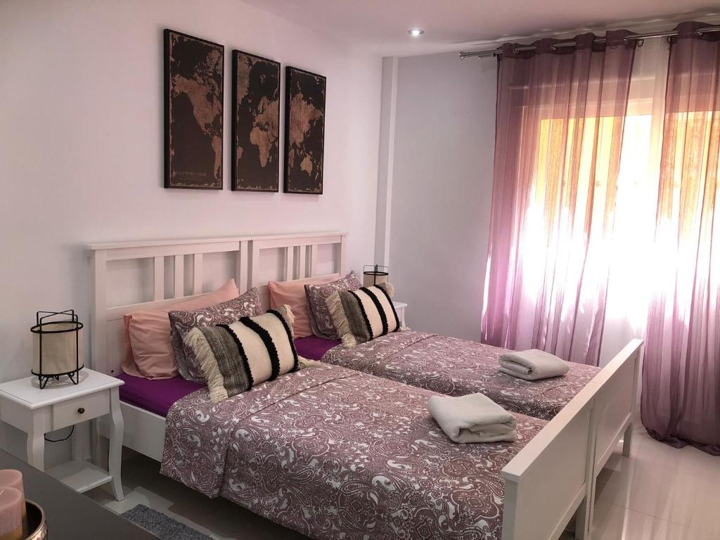 Postel nebo postele na pokoji v ubytování Apartamento con impresionantes vistas y piscina