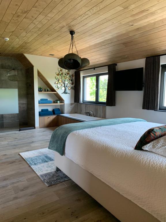 Postel nebo postele na pokoji v ubytování Vakantiewoning 't Rysselhof