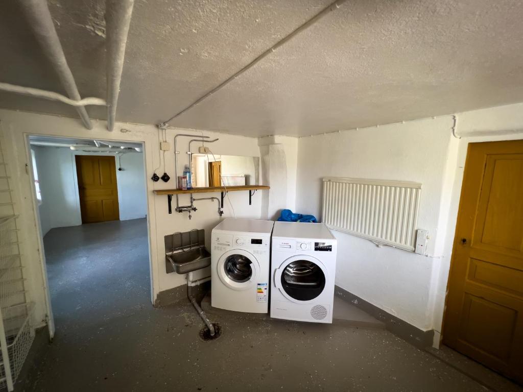 Kuchyň nebo kuchyňský kout v ubytování Sjögatan 21,