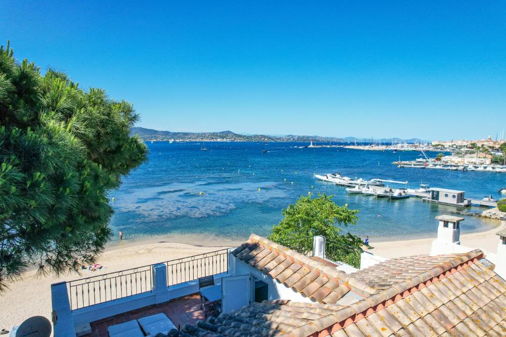 a view of a beach with boats in the water at Casa Tropez in Saint-Tropez