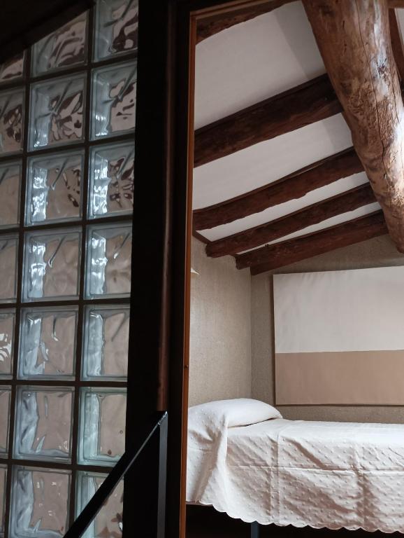 Postel nebo postele na pokoji v ubytování Casa Zapatero en Somontano