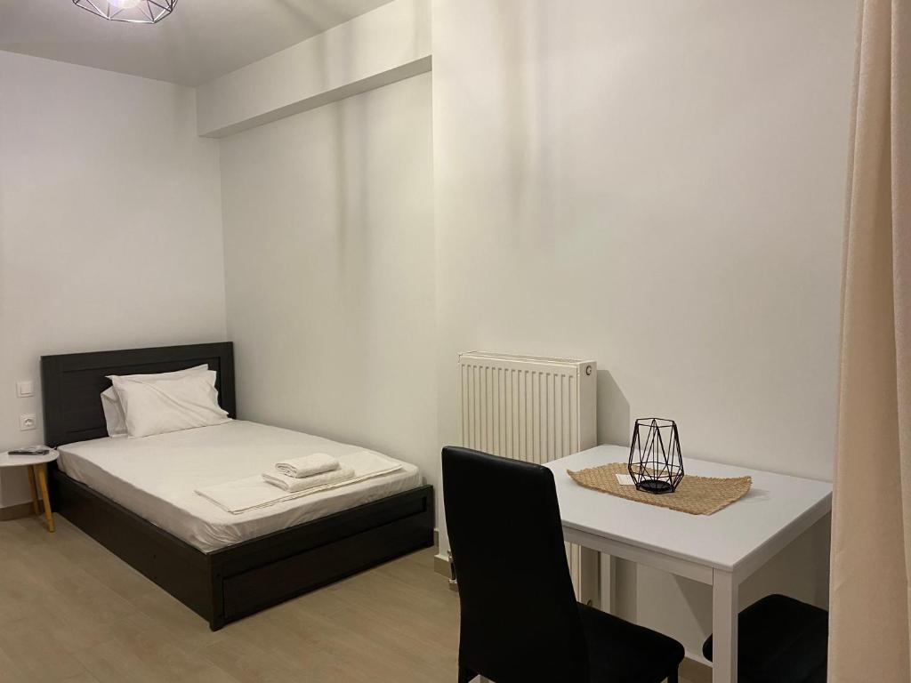 Ένα ή περισσότερα κρεβάτια σε δωμάτιο στο Atelier (KA1)