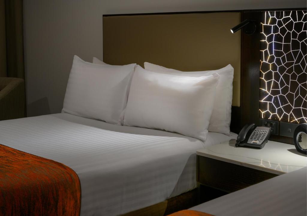 Postel nebo postele na pokoji v ubytování Hotel Grand Chancellor Hobart
