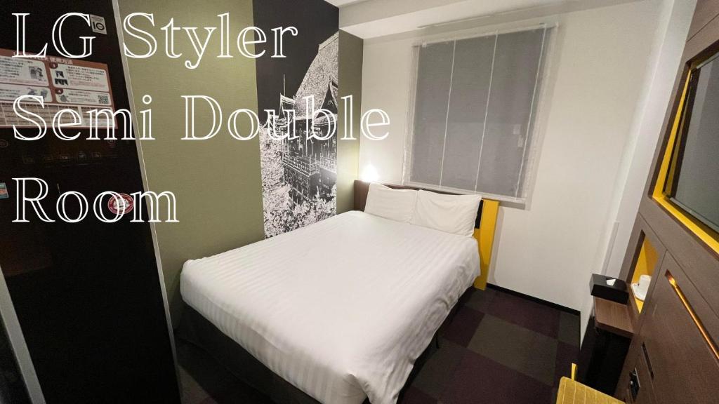 Voodi või voodid majutusasutuse Henn na Hotel Tokyo Haneda toas