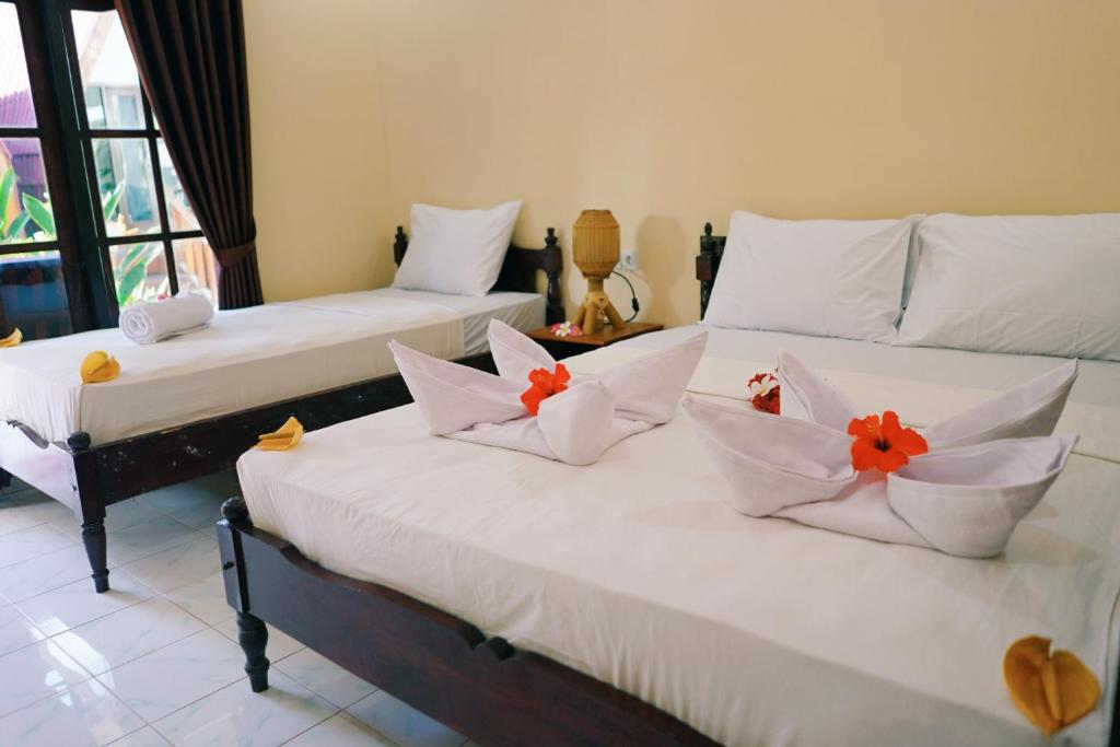 Gili Mesari Cottages & Homestay - Superior Triple Room