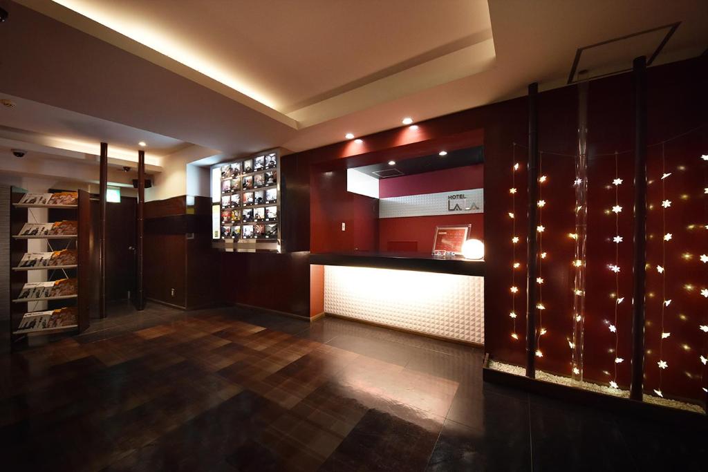 Kuchyň nebo kuchyňský kout v ubytování Hotel LALA minato - Adult Only