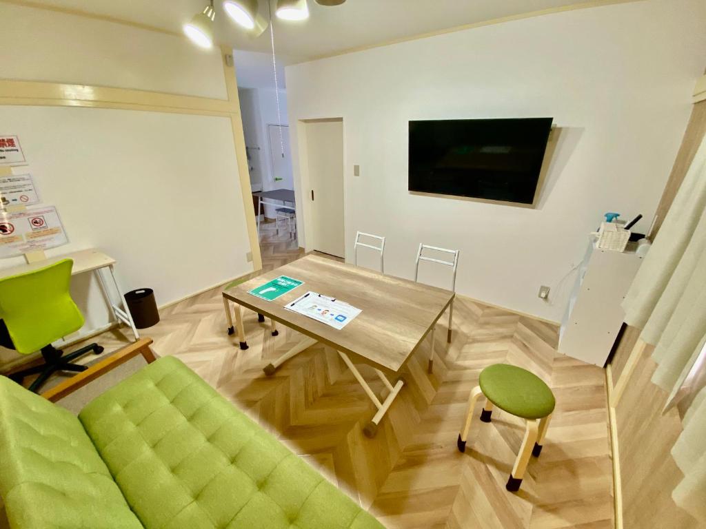 TV a/nebo společenská místnost v ubytování ARS HOTEL Utsunomiya フロア貸切