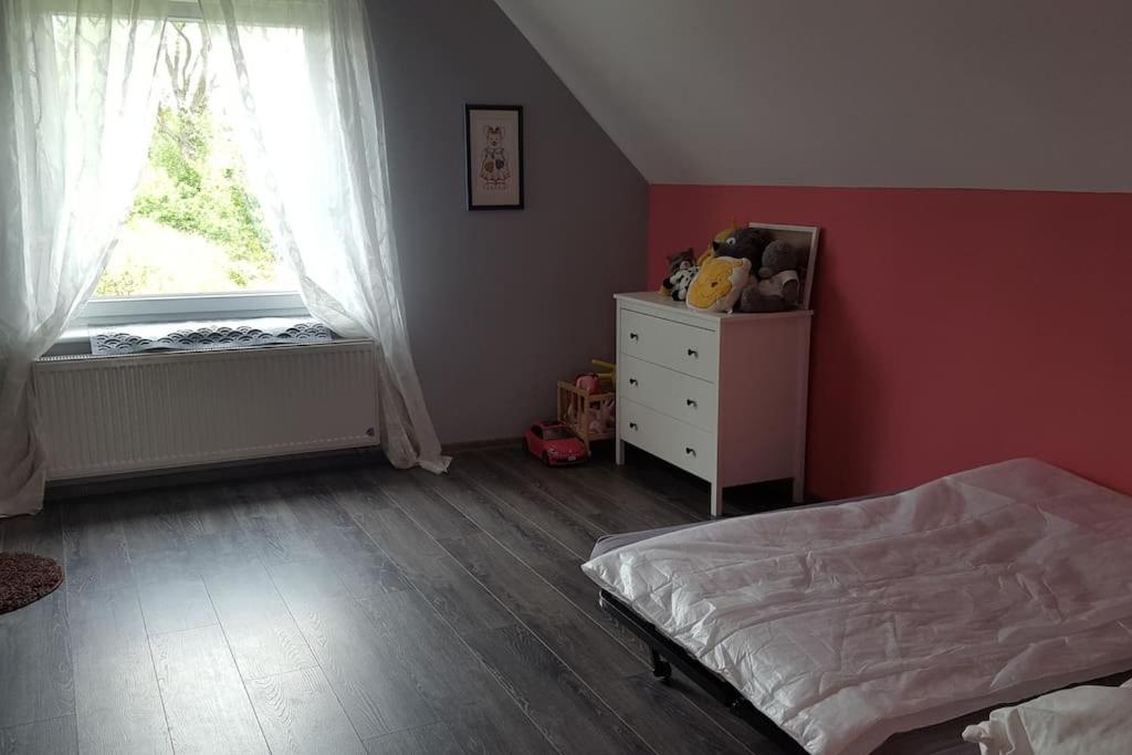 Posteľ alebo postele v izbe v ubytovaní Apartamenty Holiday Slaw jacuzzi bilard