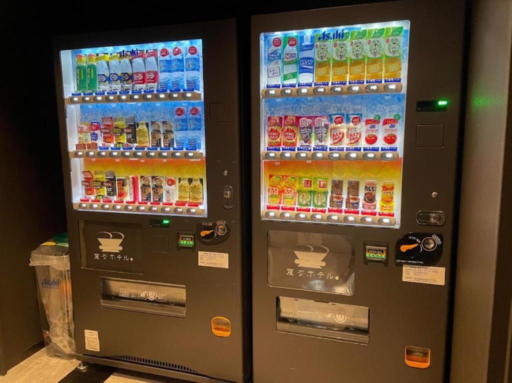 a vending machine filled with lots of drinks at Henn na Hotel Premier Nara in Nara