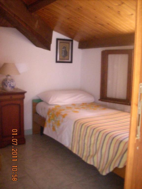 A bed or beds in a room at Stella Marina