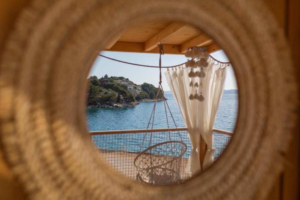 a view of the ocean from a window of a boat at Mara's Coast - Giulia in Drage
