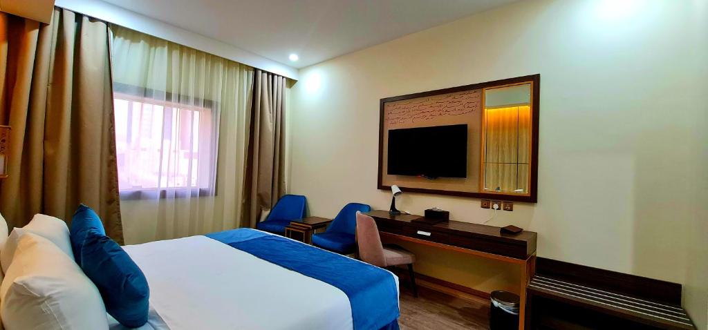 TV a/nebo společenská místnost v ubytování Al Ebaa Hotel