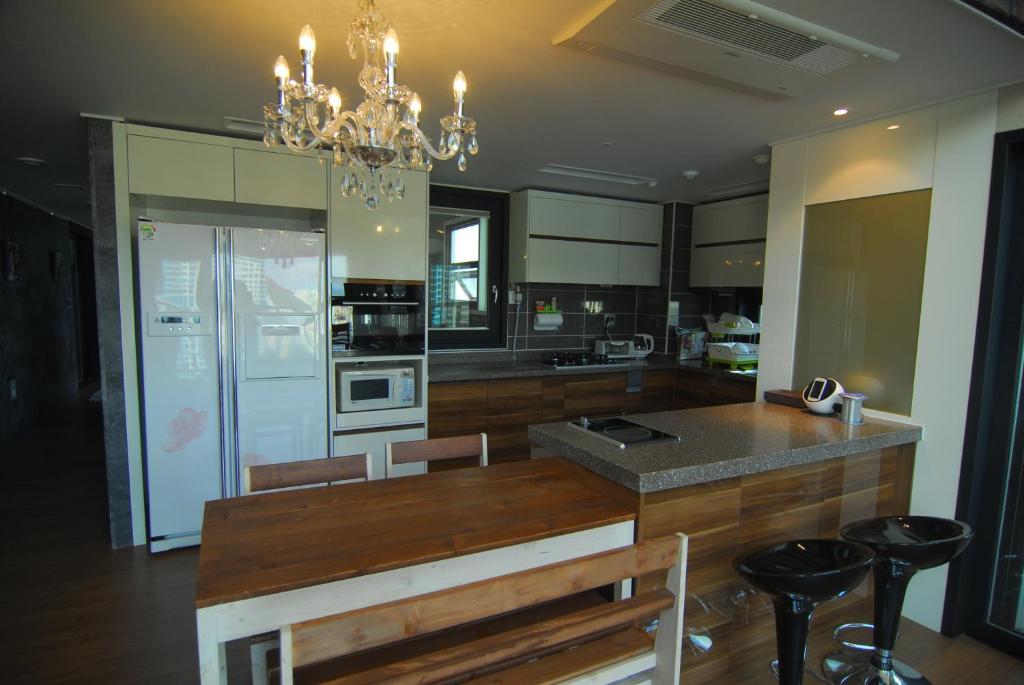 Kuchyň nebo kuchyňský kout v ubytování Dynamic Guesthouse