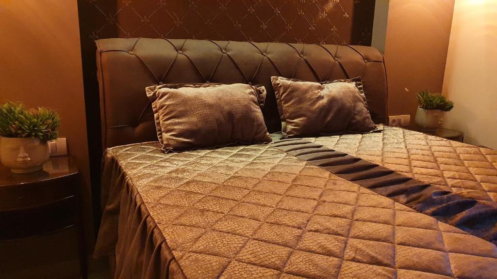 Postel nebo postele na pokoji v ubytování Castello Inn