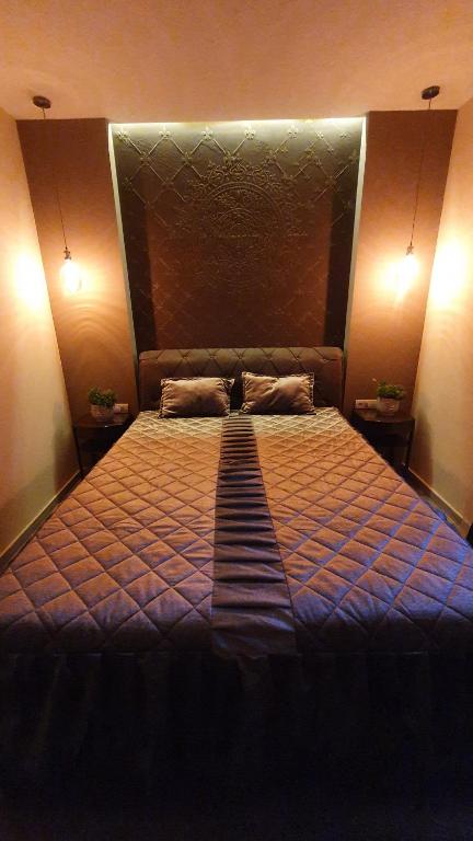 Postel nebo postele na pokoji v ubytování Castello Inn