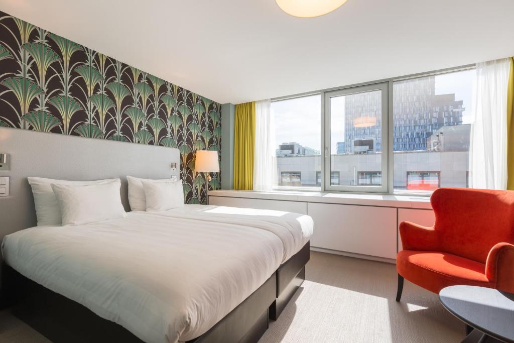 Postel nebo postele na pokoji v ubytování Thon Hotel EU