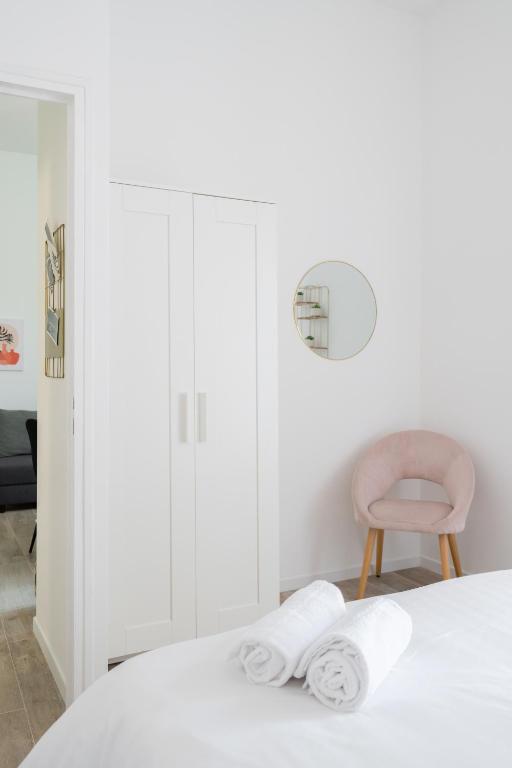 Posteľ alebo postele v izbe v ubytovaní Le Concorde 1 - Appartement 1 chambre Terrasse Clim Calanques Vélodrome