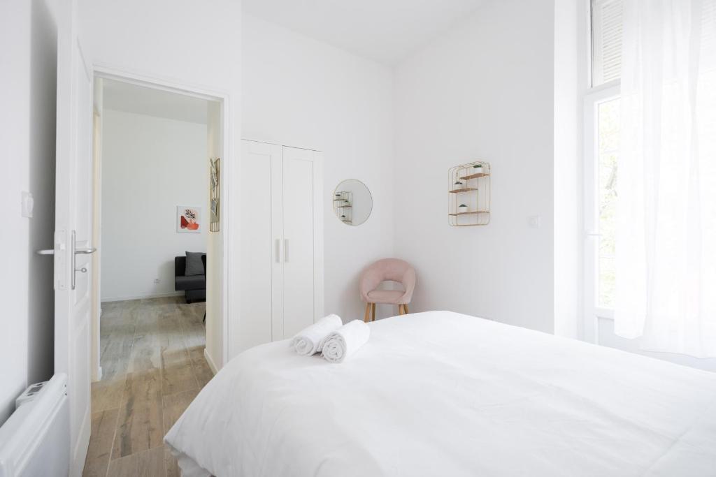 Posteľ alebo postele v izbe v ubytovaní Le Concorde 1 - Appartement 1 chambre Terrasse Clim Calanques Vélodrome