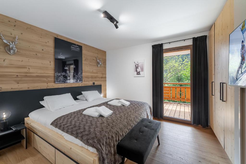 TV a/nebo společenská místnost v ubytování Quintessence - Apt B303 - Châtel - Châtel Multipass Été 2025 en option au tarif de 3euros par jour et par personne