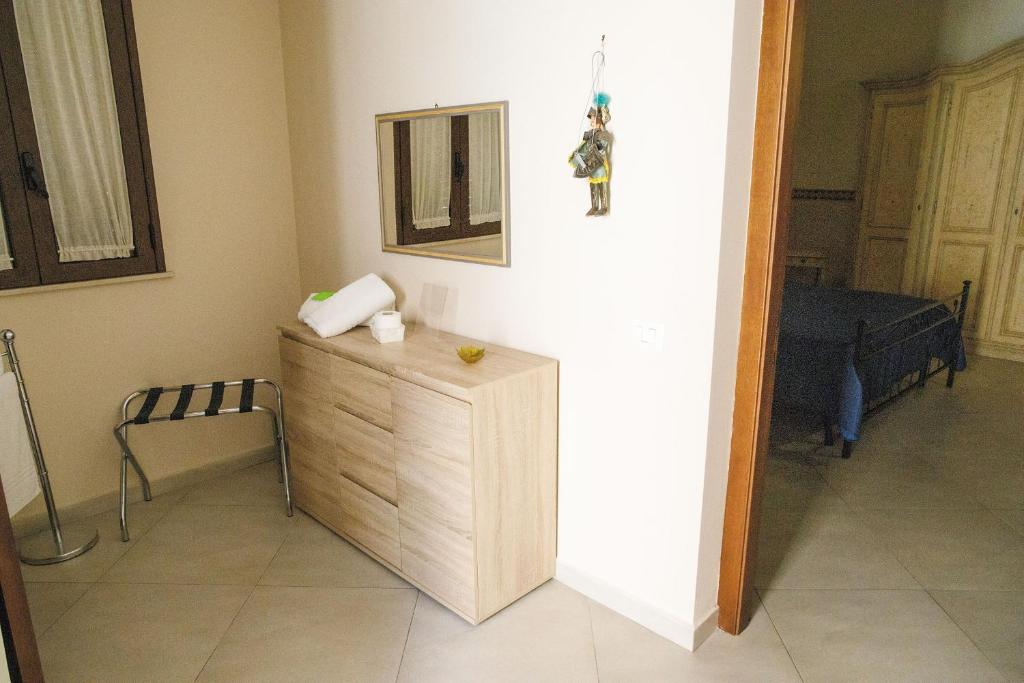 Postel nebo postele na pokoji v ubytování B&B Principe Augusta