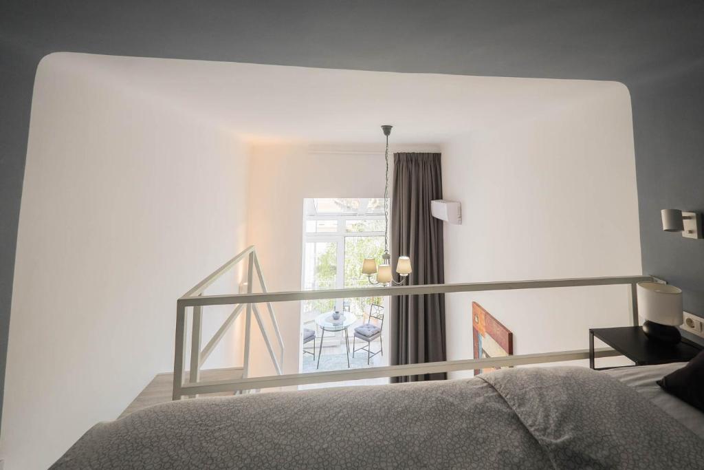 Posteľ alebo postele v izbe v ubytovaní Gallery Duplex Studio