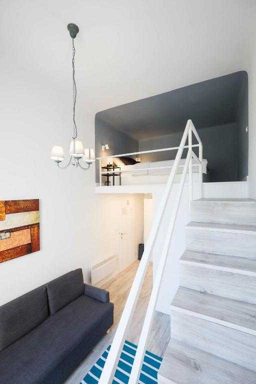 Televízia a/alebo spoločenská miestnosť v ubytovaní Gallery Duplex Studio
