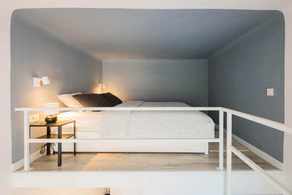 Posteľ alebo postele v izbe v ubytovaní Gallery Duplex Studio