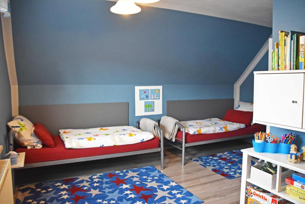 Postel nebo postele na pokoji v ubytování Ferienhaus _Hasenland_