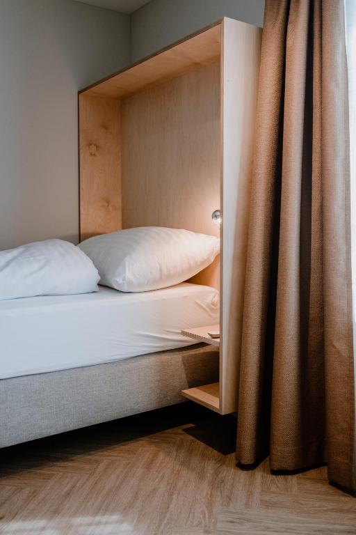 Postel nebo postele na pokoji v ubytování Hotel Müllers Self-Check-In