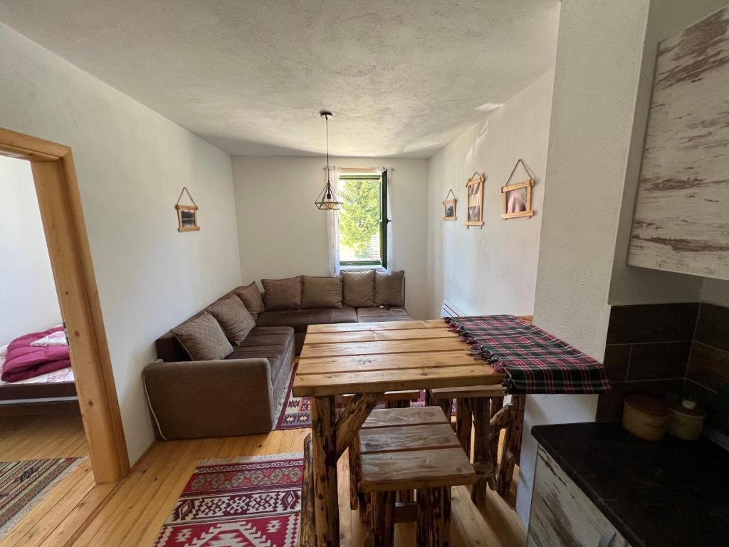 Predel za sedenje v nastanitvi Dormire Apartmans