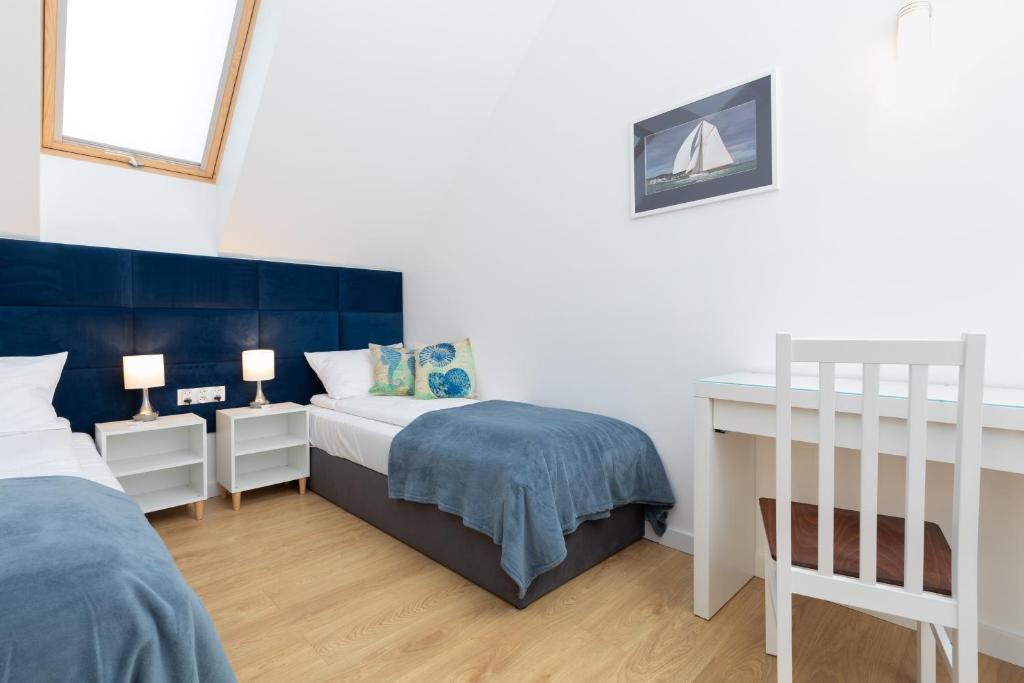 Postel nebo postele na pokoji v ubytování Horizon Park Apartment by Noclegi Renters