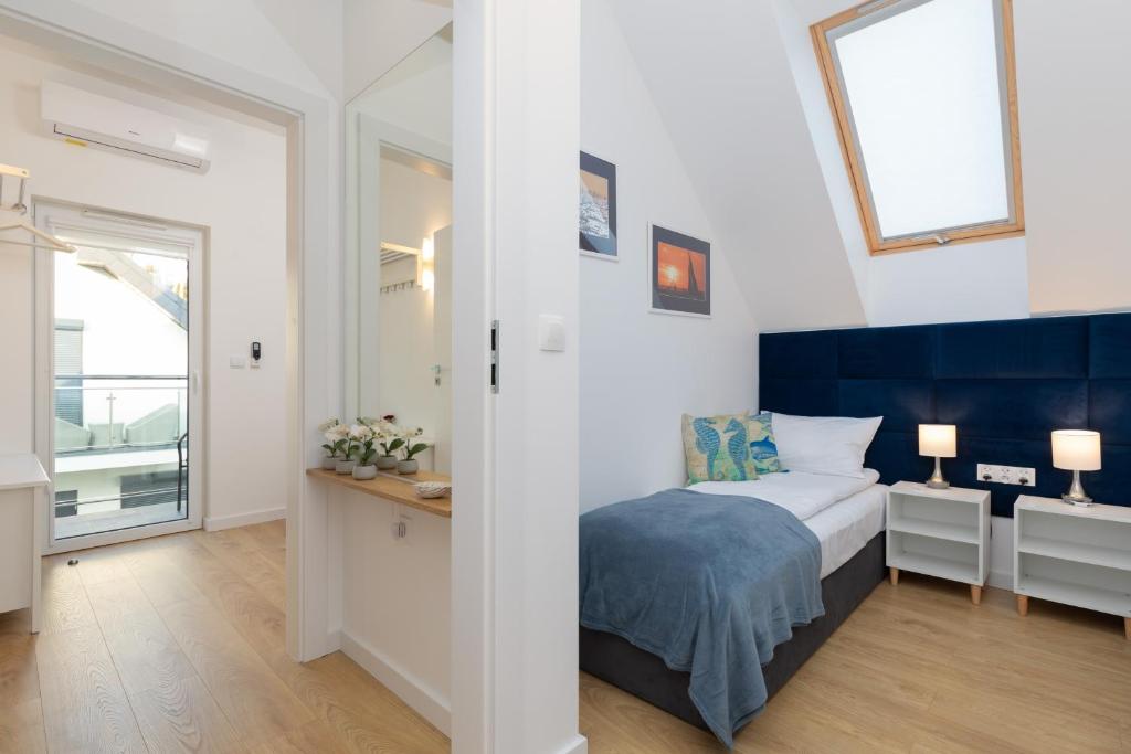 Postel nebo postele na pokoji v ubytování Horizon Park Apartment by Noclegi Renters