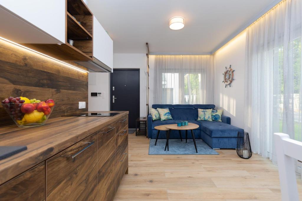 Kuchyň nebo kuchyňský kout v ubytování Horizon Park Apartment by Noclegi Renters