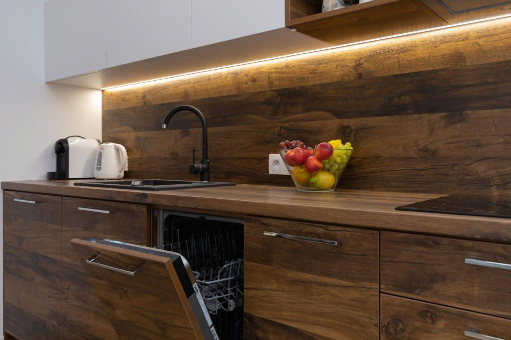 Kuchyň nebo kuchyňský kout v ubytování Horizon Park Apartment by Noclegi Renters