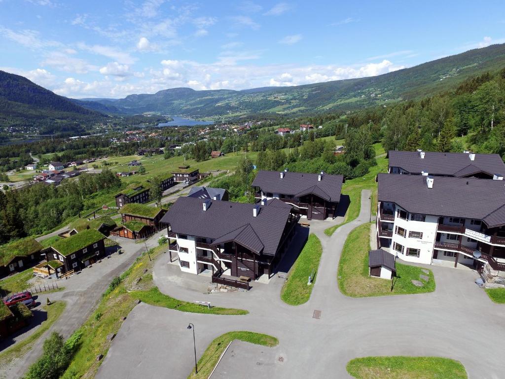 an aerial view of a resort with mountains in the background at Alpin Apartments Sørlia in Hafjell