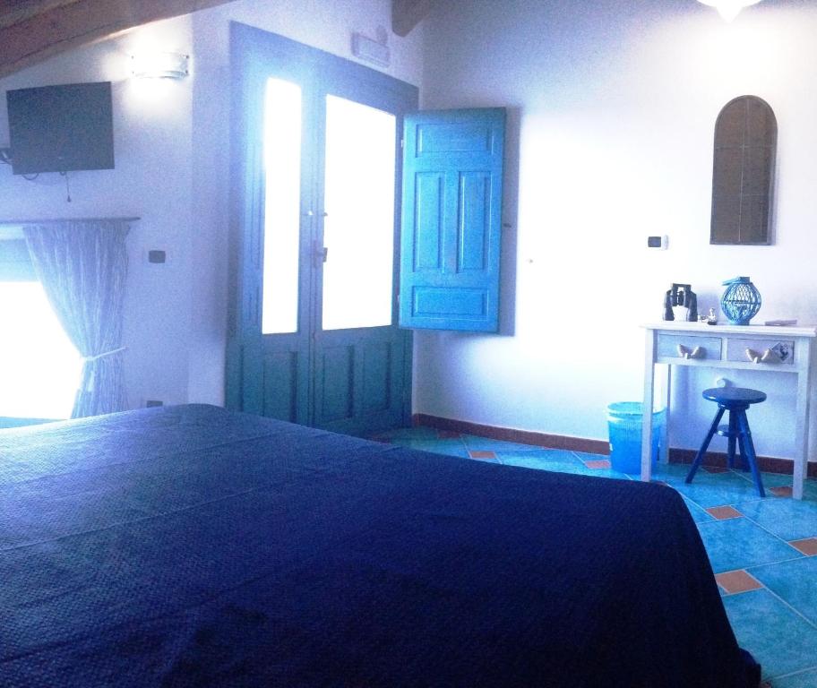 Letto o letti in una camera di Casa il Soffio di Eolo