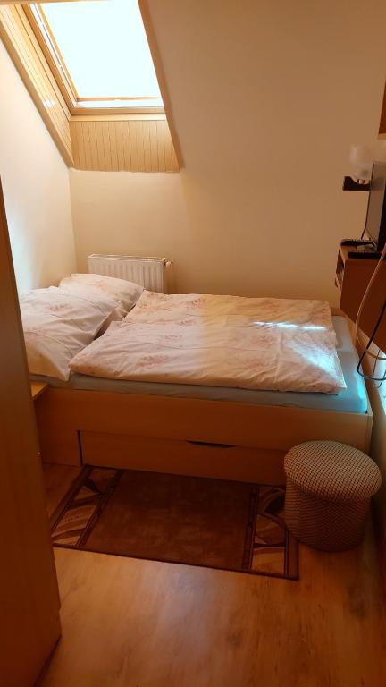 Postel nebo postele na pokoji v ubytování Ádám Vendégház