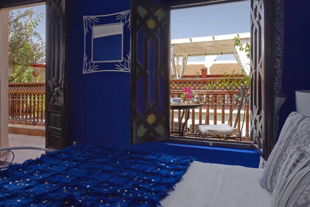 Postel nebo postele na pokoji v ubytování Riad 58 Blu