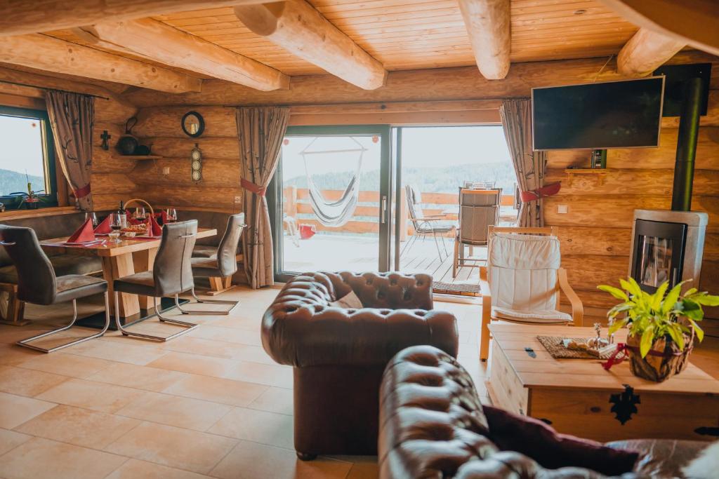 Posedenie v ubytovaní Adlerkopfhütte