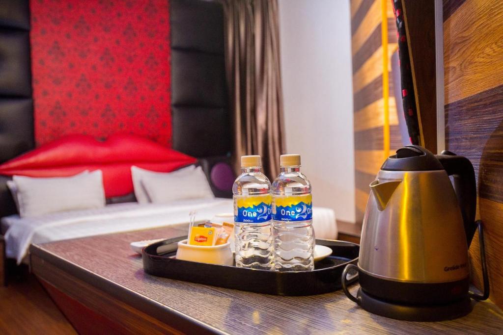 Postel nebo postele na pokoji v ubytování Hotel Holmes Gp