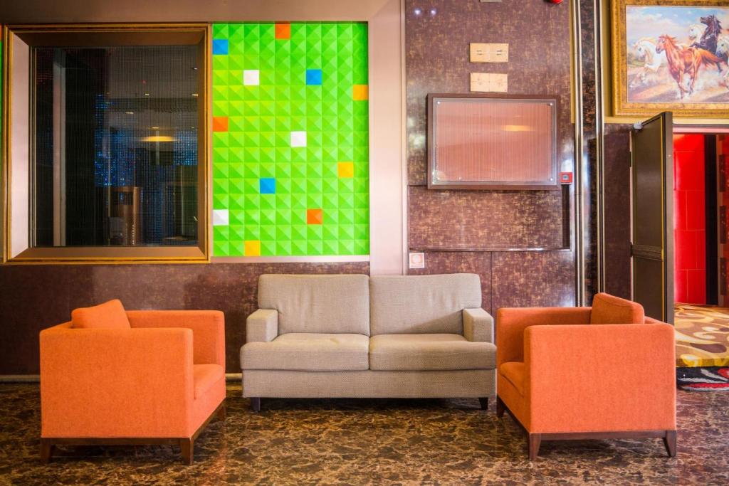 Posezení v ubytování Hotel Holmes Gp