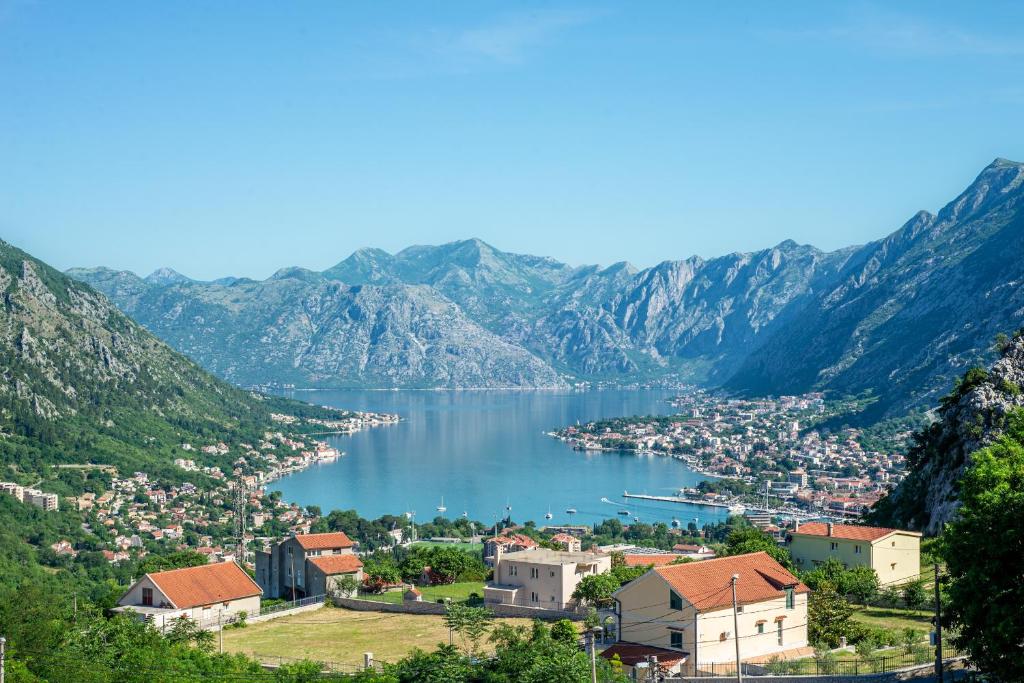 a view of a town and a body of water at Apartments Golden View in Kotor
