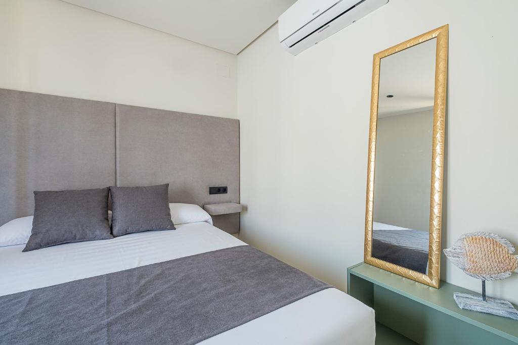 Posteľ alebo postele v izbe v ubytovaní ON City Apartments