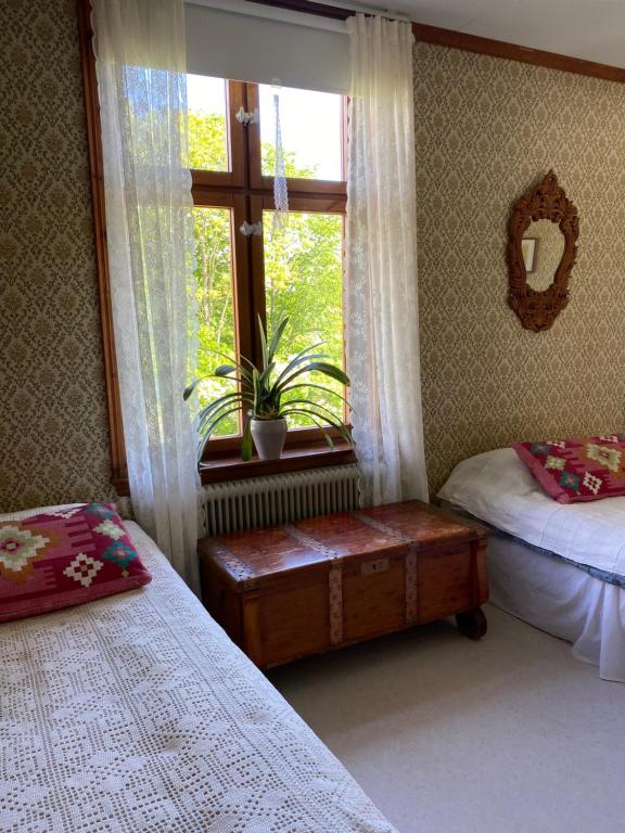 Postel nebo postele na pokoji v ubytování Himmelskällan