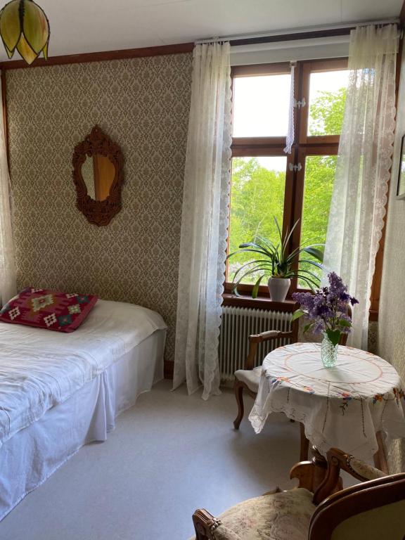 Postel nebo postele na pokoji v ubytování Himmelskällan