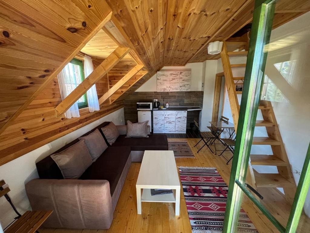Predel za sedenje v nastanitvi Dormire Apartmans