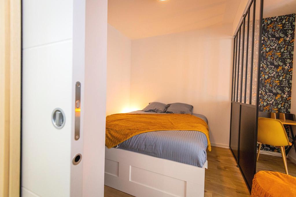 Posteľ alebo postele v izbe v ubytovaní KASA SAINT QUENTIN - Tout équipé & Cosy
